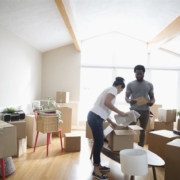 a couple putting things in a box | On Target Home Inspection | Preventing Pests Orland Park