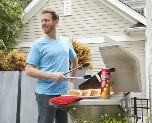 a man grilling | On Target Home Inspection | Kitchen Safety Tips Orland Park